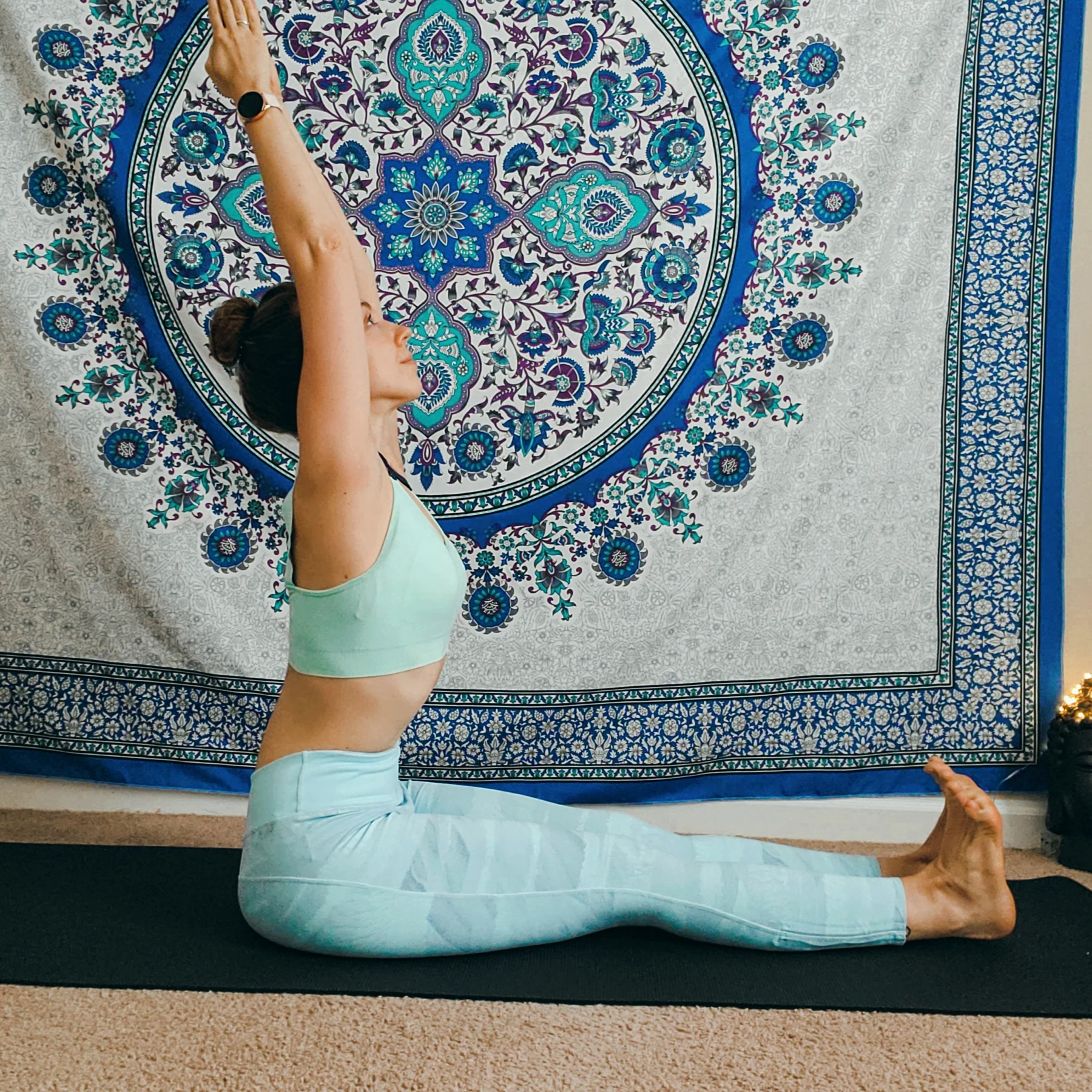 Anandi in a seated yoga practice
