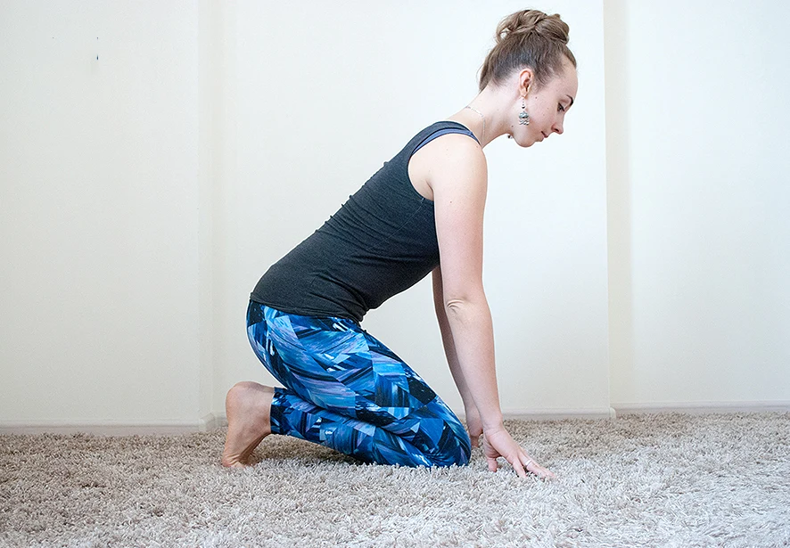 Step 2: Roll forward over crossed ankles