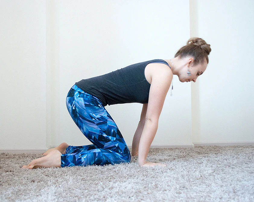 Step 1: Cross ankles with knees wide